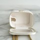 Chanel small gold ball makeup bag 