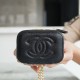 Chanel small gold ball makeup bag 